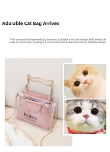 Detail of pink PVC jelly bag with metal cat-ear handle and gold chain strap