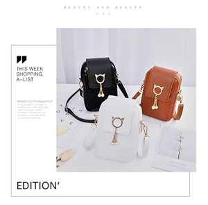 Close-up of three woven texture crossbody bags with cat ear ring and pearl tassels