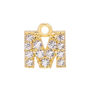 Detailed macro shot of gold-plated letter M pendant with micro-paved cubic zirconia