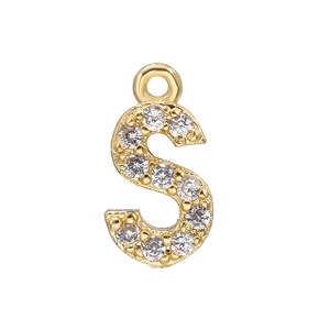 Macro shot of gold-plated S-letter pendant inlaid with sparkling white cubic zirconia