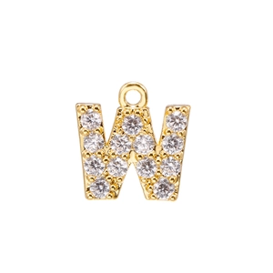 Macro shot of gold-plated letter W pendant with micro-pave cubic zirconia inlay