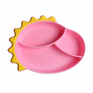 Detail of pink silicone dinosaur plate with yellow scales and three divided food compartments