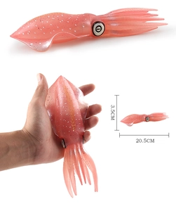 Detailed view of 20.5cm soft pink squid lure showing flexible texture and lifelike glitter