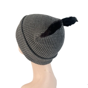Rear view of grey knit beanie with cute black faux fur cat ears on a model