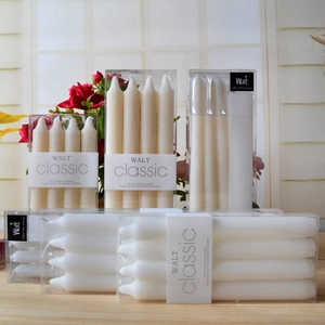Classic smokeless and dripless ivory white taper candles in a set of four for dining