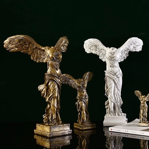 Classic Nike of Samothrace goddess statue in bronze gold and matte white finishes