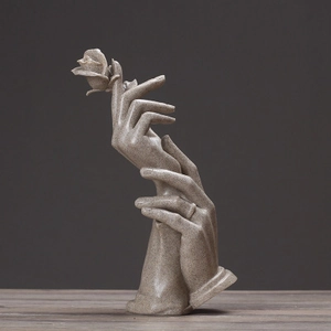 Modern sandstone resin sculpture of hands holding a rose flower for home decor
