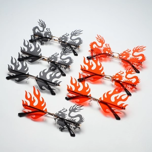 Trendy rimless sunglasses with dragon and flame shaped lenses in red and smoke grey