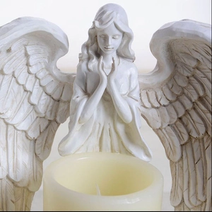 European white resin praying angel statue with a pillar candle for home decoration