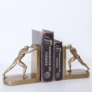 Nordic minimalist athlete sculpture bookends in vintage gold finish for shelf decor
