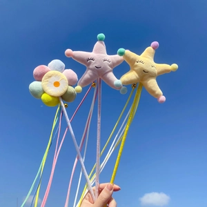Interactive cat wand toy with plush starfish, flowers, colorful ribbons and bells