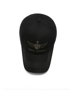 Top down macro view of black twill cotton baseball cap with detailed wing emblem embroidery