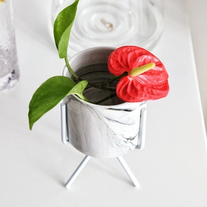 Grey marble texture ceramic planter with white metal tripod stand for home decor