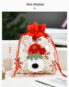 Detailed view of white Christmas drawstring bag with 3D polar bear and 21x24cm size