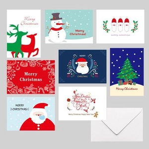 Set of assorted American style hand-drawn Christmas cards with white envelopes