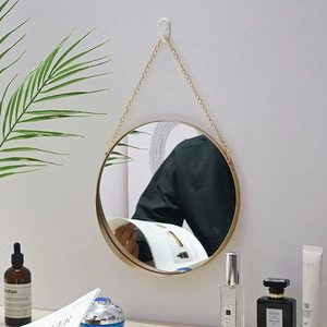 Nordic round wall mirror with golden frame and hanging chain for elegant bathroom decor