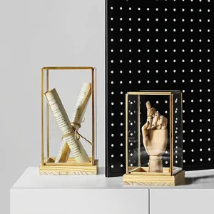 Nordic brass glass display case with a solid wood base for elegant home decor