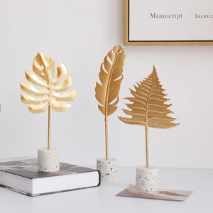 Nordic gold metal monstera leaf ornaments with terrazzo base for home desktop decor