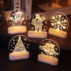 Festive 3D acrylic Christmas night lights with snowman and Santa motifs in warm yellow
