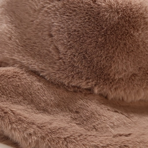 Close-up detail of soft brown faux rabbit fur material on this winter bucket hat