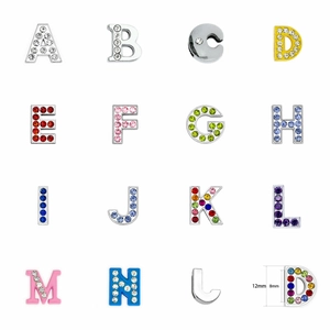 Macro view of 8mm rhinestone alloy alphabet beads in various colors for DIY jewelry