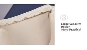 Detalle de neceser beige de gran capacidad con cremallera suave y textura de cuero sintético