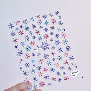 Detail showing 5D embossed colorful snowflake nail stickers with crystal snow design