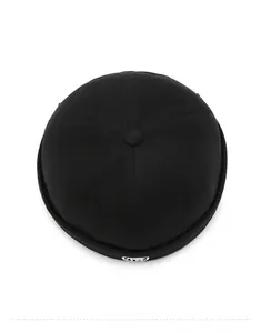 Top down view of black brimless miki hat with embroidered circular logo and six panel crown