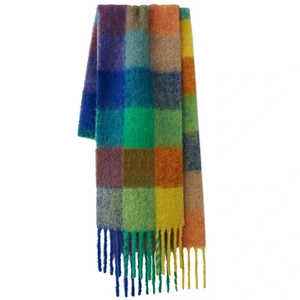 Rainbow plaid scarf with colorful checkered pattern and fringe details on white background