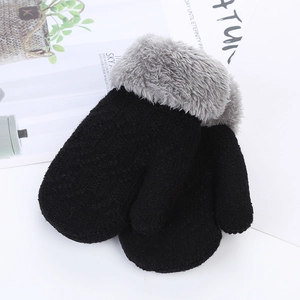 Detail of warm black knit mittens with grey plush cuffs for toddlers and kids