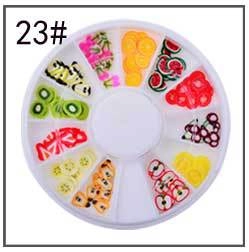 Vue détaillée d'une roue à 12 compartiments de tranches de fruits en pâte polymère pour ongles