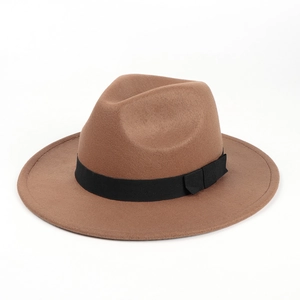 Detailed view of a brown wool felt fedora hat featuring a classic black grosgrain ribbon