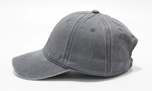 Side view of a washed charcoal grey cotton baseball cap with vintage distressed texture