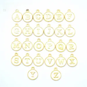 Detailed set of 26 gold alloy round pendants featuring A-Z engraved letters with knurled edges