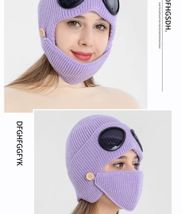 Detail of purple ribbed knit pilot beanie with integrated face mask and goggles