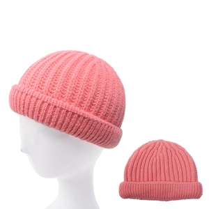 Pink rib-knit beanie for kids, warm thick winter hat shown in two professional angles