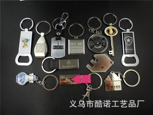 Collection of metal keychains with laser engraving and various craft details