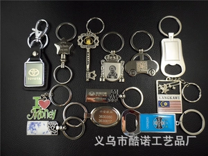 Detailed collection of custom metal keychains with laser engraving and logo designs
