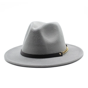 Grey wool fedora hat with black leather band and gold metal chain accent on white background