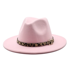 Detail showing pink wool fedora hat with leopard print band and gold metal buckle trim