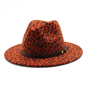 Classic orange leopard print fedora with dark brown leather band and bronze studs