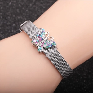 Titanium steel mesh bracelet with colorful butterfly charm on wrist with dark background