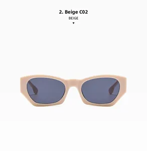 Detail of beige geometric sunglasses with dark lenses and wide stylish frames