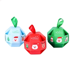 Creative 3D Christmas gift boxes in red, blue, and green with festive holiday patterns