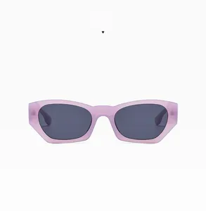 Close-up of jelly purple geometric wide-frame sunglasses with dark grey lenses