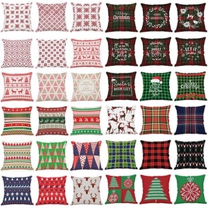 Macro detail of various Christmas pillow cover designs in red and green festive patterns