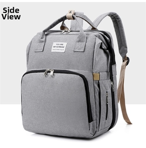 Side view of gray multifunctional diaper backpack with durable fabric and large front pocket