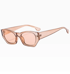 Detail of amber geometric cat-eye sunglasses with thick frames and metal hinges