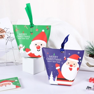 Christmas paper gift boxes in blue and green with ribbons and cute cartoon illustrations