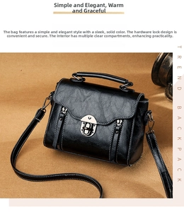 Detail of retro black crossbody bag showing textured leather and vintage metal buckle